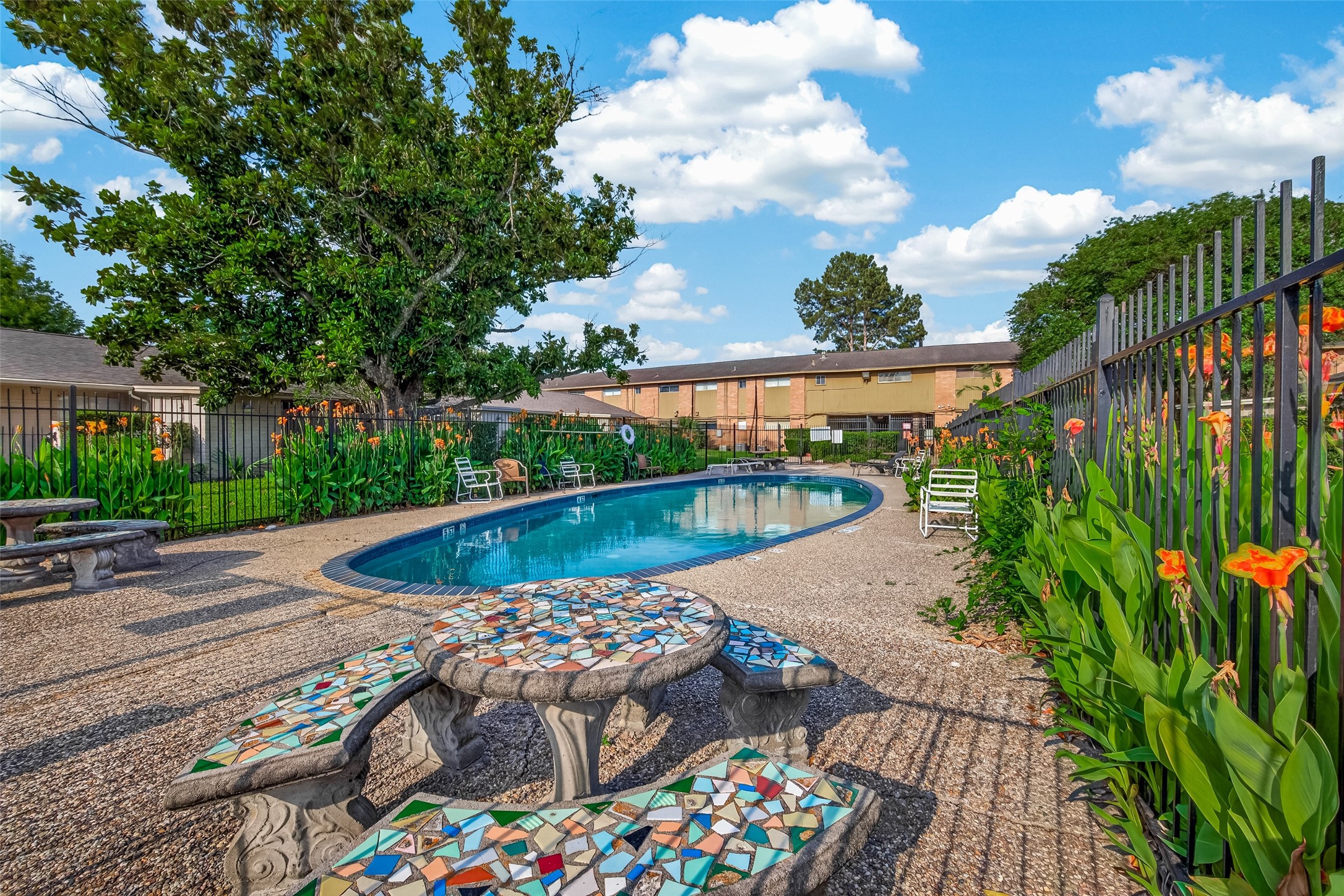1529 Wirt Road, Unit 1 Houston, TX 77055 - Photo 14 of 16 a view of a swimming pool with a patio