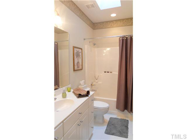 10415 Hallingdale Court Raleigh, NC 27614 - Photo 20 of 25 Guest Bathroom on first floor with skylight. Bathroom