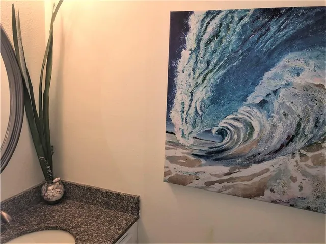 a view of front door and wooden floor