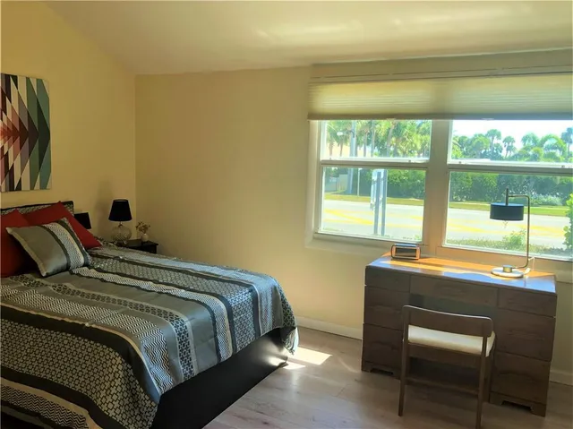 a view of livingroom with hardwood floor and hallway