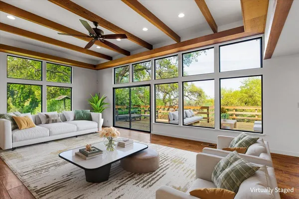 a view of an entryway with wooden floor