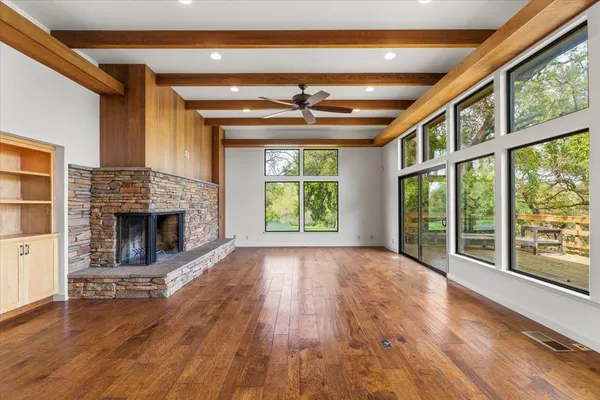 a view of kitchen with kitchen island and wooden floor
