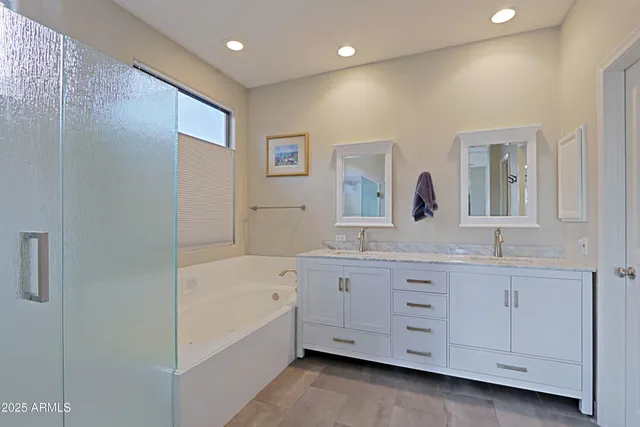 a view of a patio with couches table and chairs and potted plants