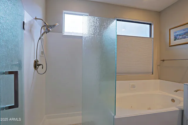 a view of a patio with table and chairs and potted plants