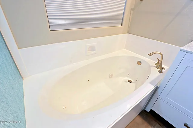 a view of a tables and chairs in patio