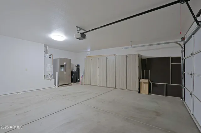 a view of a porch with furniture and a yard