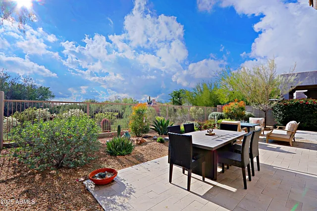 a view of a terrace with outdoor seating