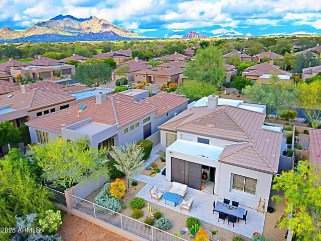 a room with furniture a large window and a sink