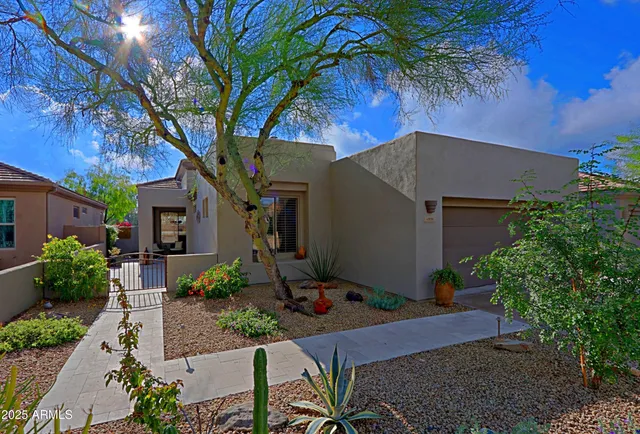 an aerial view of residential building and parking space