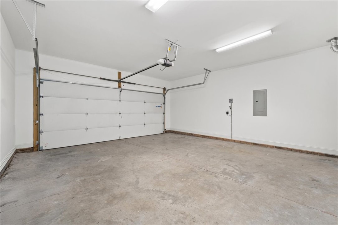 102 Ripplestone Way Anderson, SC 29621 - Photo 32 of 39 Ample garage space provides convenience and secure parking for vehicles.