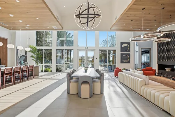 a large living room with large windows