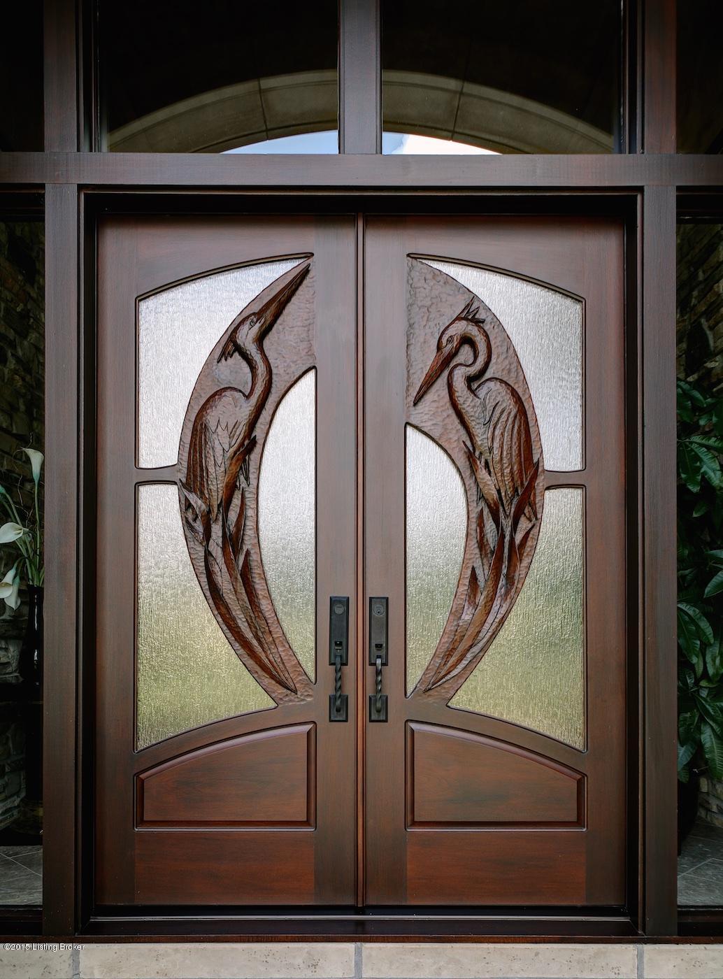 Entry with Custom Doors and Marble Floors