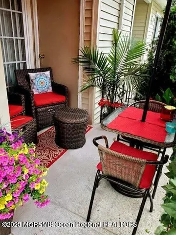 a backyard of a house with seating space