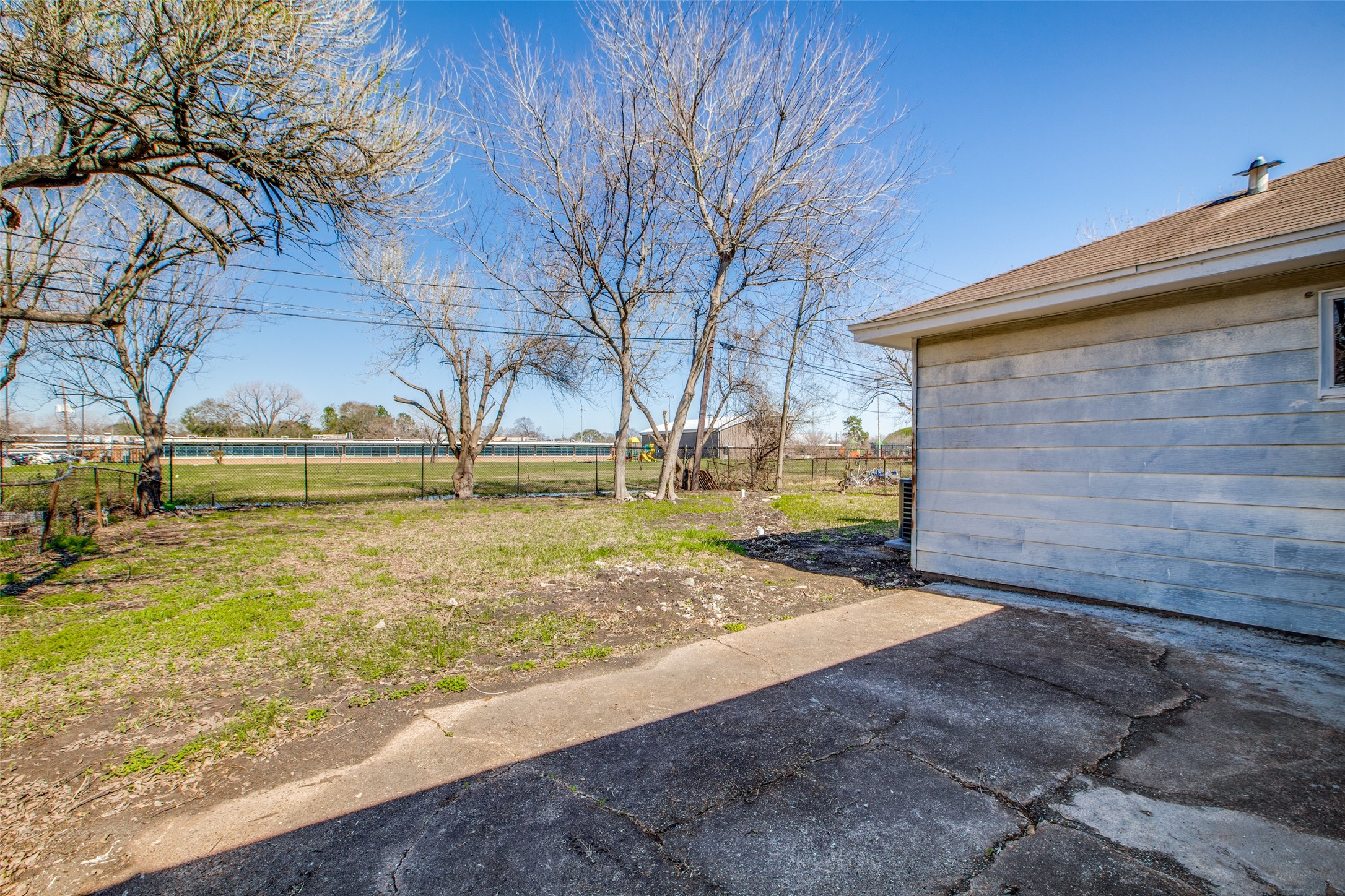 8615 Josie Street Houston, TX 77029 - Photo 25 of 25 a view of a yard with an outdoor space