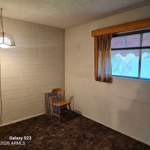 a view of a room with a window