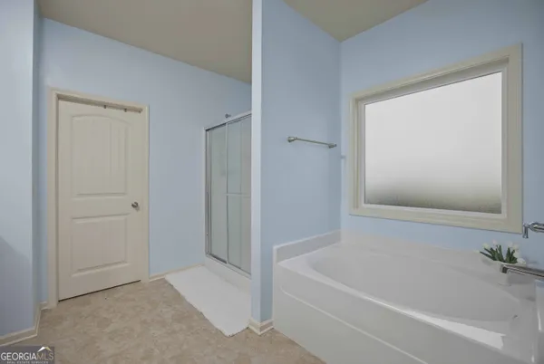 a bathroom with a bathtub