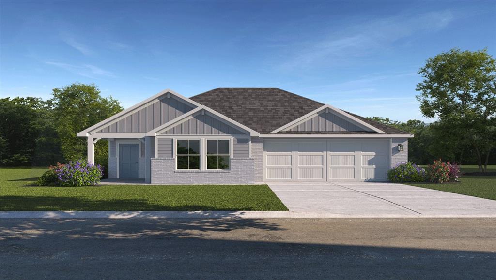 a front view of a house with yard