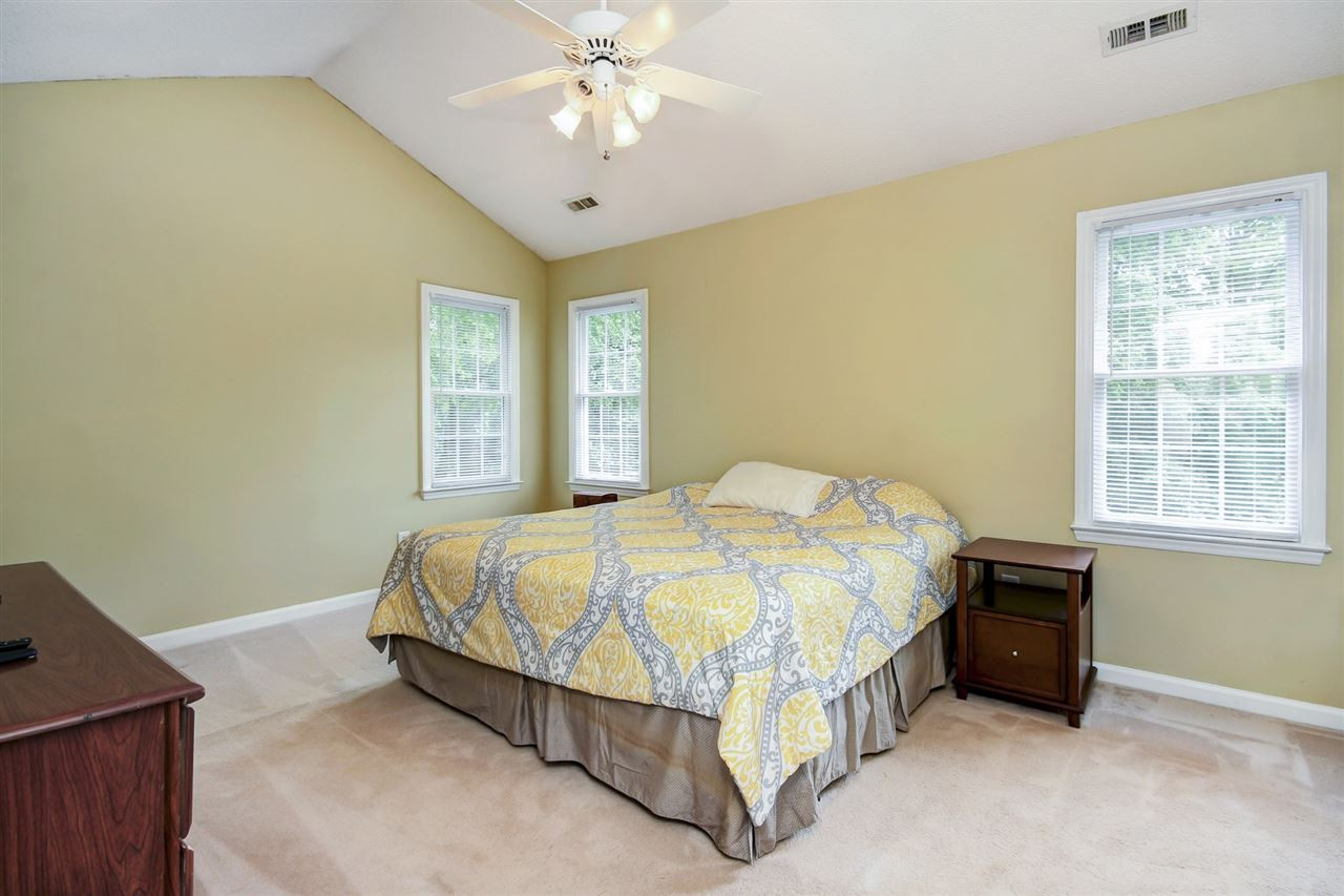 5300 Halcott Court Raleigh, NC 27613 - Photo 13 of 23 Very spacious master bedroom with arched ceiling and ceiling fan. Master Bedroom