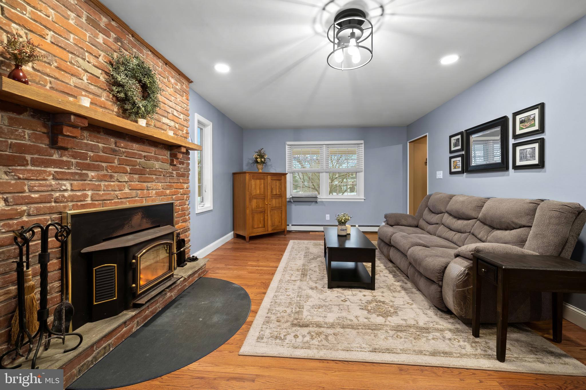 1501 Keystone Drive Hatfield, PA 19440 - Photo 13 of 45 Living room with light wood finished floors and re