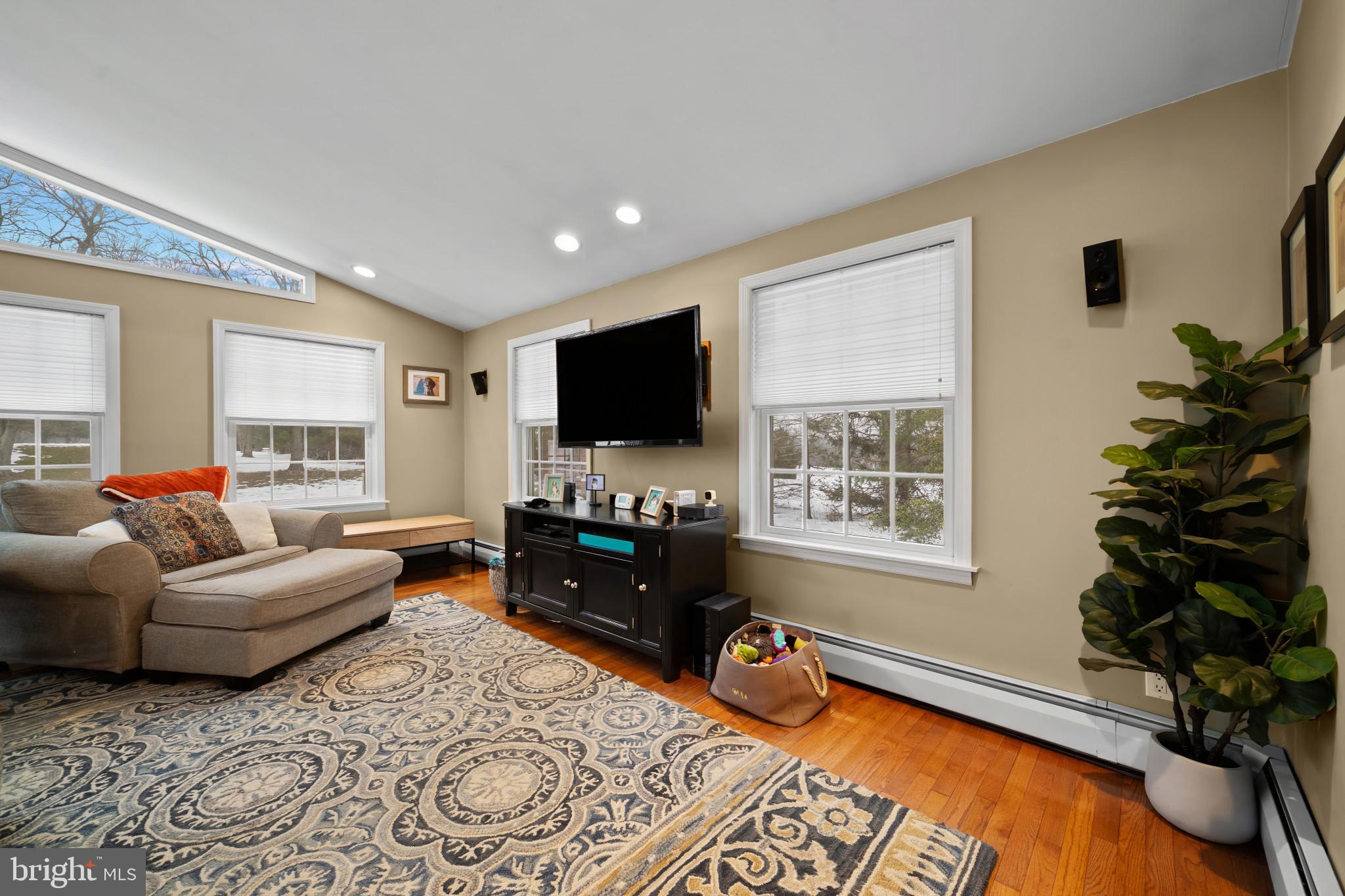 1501 Keystone Drive Hatfield, PA 19440 - Photo 16 of 45 Living area featuring light wood-style floors, a b