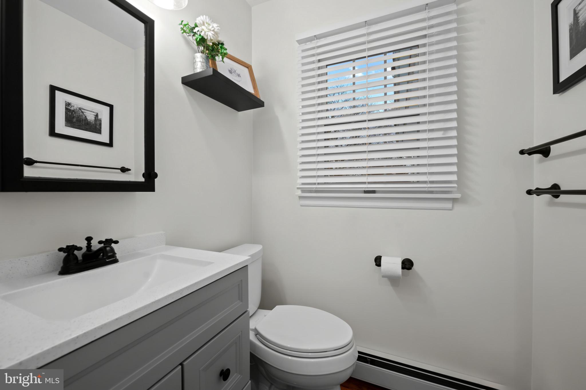 1501 Keystone Drive Hatfield, PA 19440 - Photo 27 of 45 Bathroom with a baseboard radiator and vanity