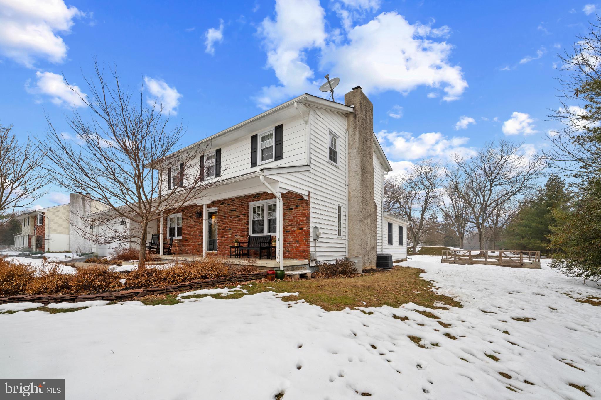 1501 Keystone Drive Hatfield, PA 19440 - Photo 3 of 45 View of front facade with brick siding, a patio, a