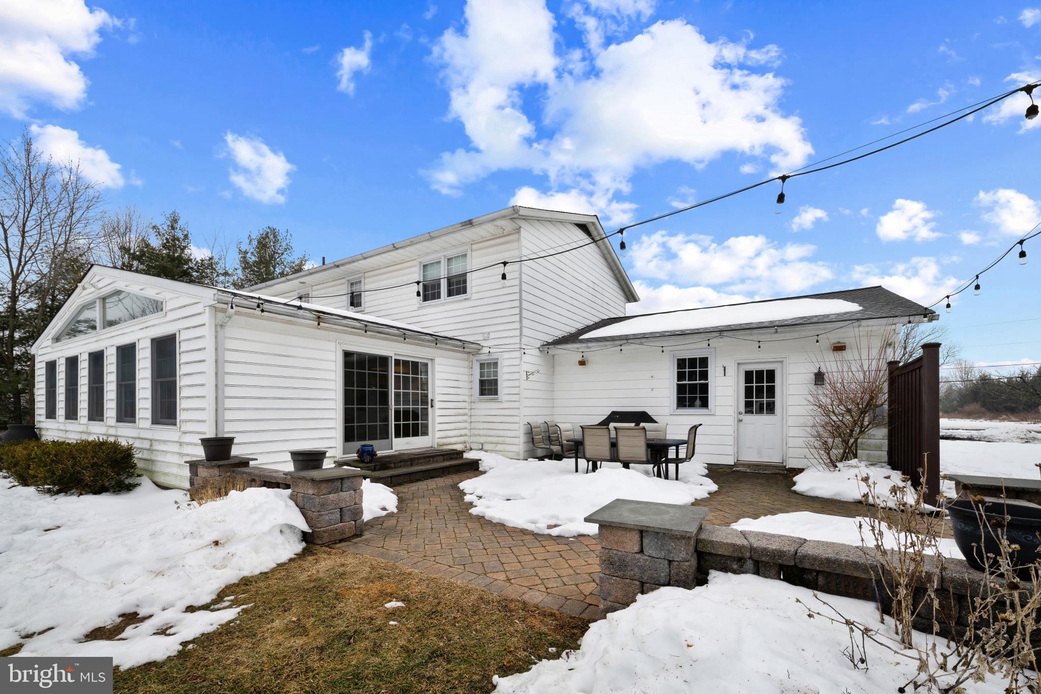 1501 Keystone Drive Hatfield, PA 19440 - Photo 40 of 45 Snow covered property with entry steps, a patio ar