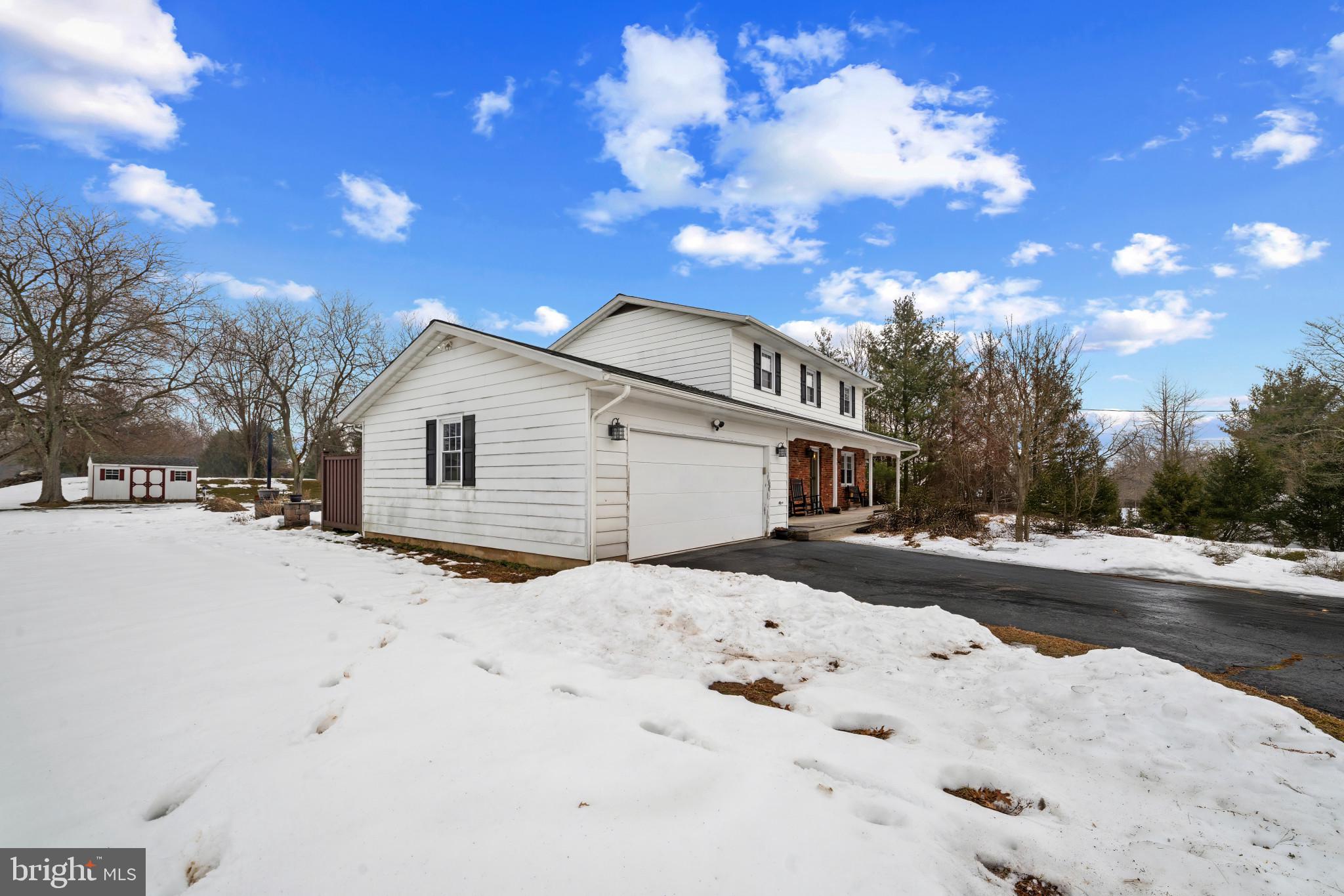 1501 Keystone Drive Hatfield, PA 19440 - Photo 4 of 45 Snow covered property featuring an attached garage