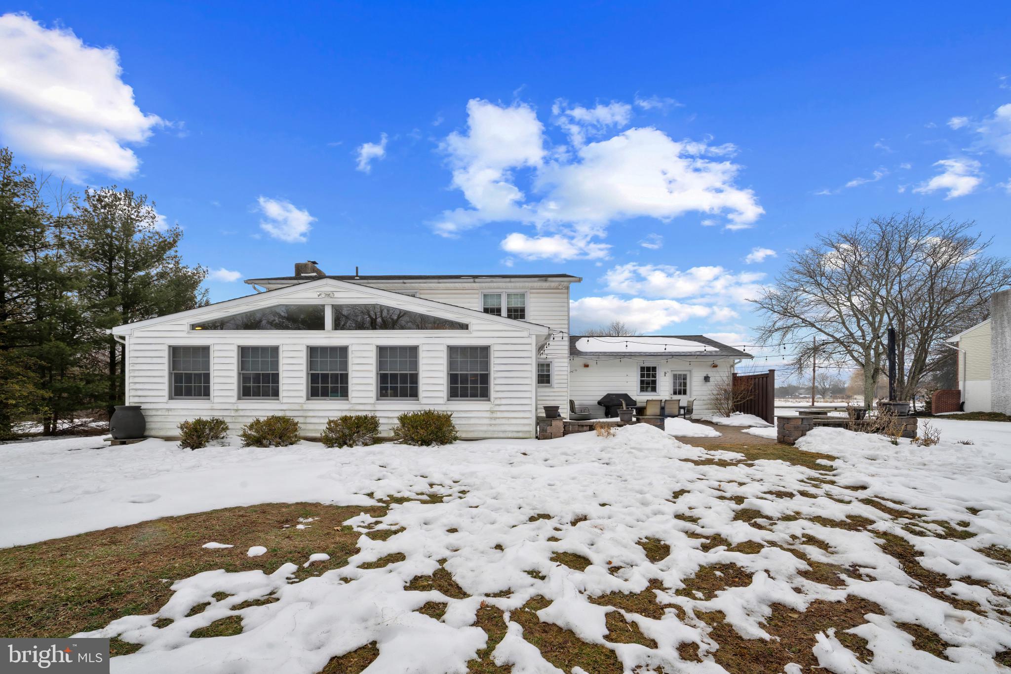 1501 Keystone Drive Hatfield, PA 19440 - Photo 41 of 45 Snow covered rear of property featuring a patio ar