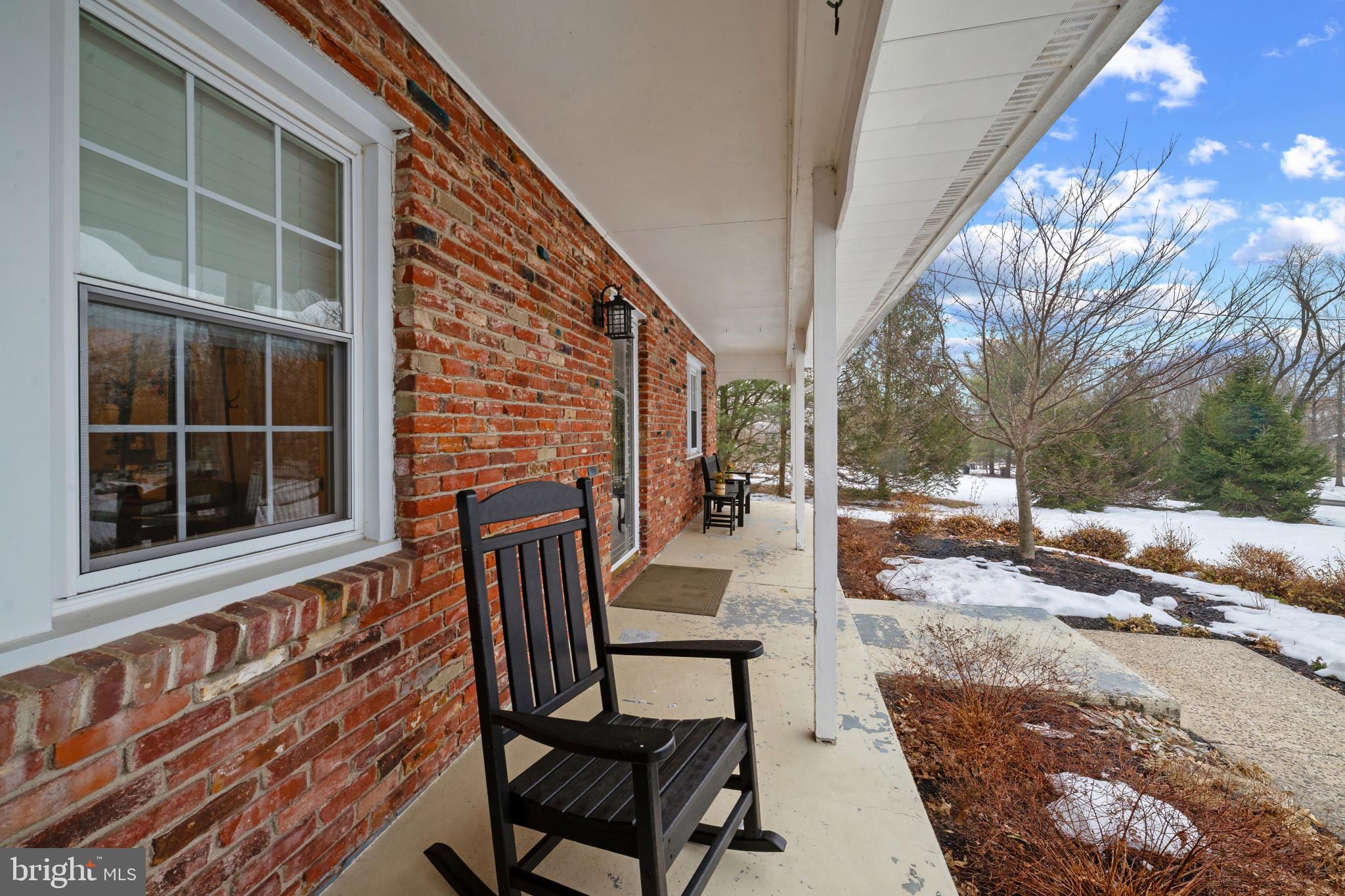 1501 Keystone Drive Hatfield, PA 19440 - Photo 5 of 45 Snow covered patio featuring covered porch