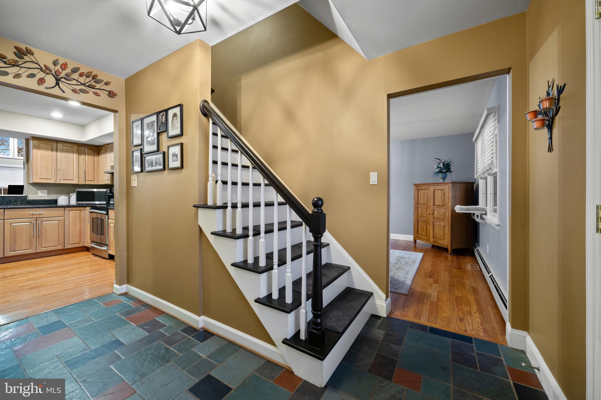 1501 Keystone Drive Hatfield, PA 19440 - Photo 9 of 45 Staircase featuring stone tile flooring and basebo