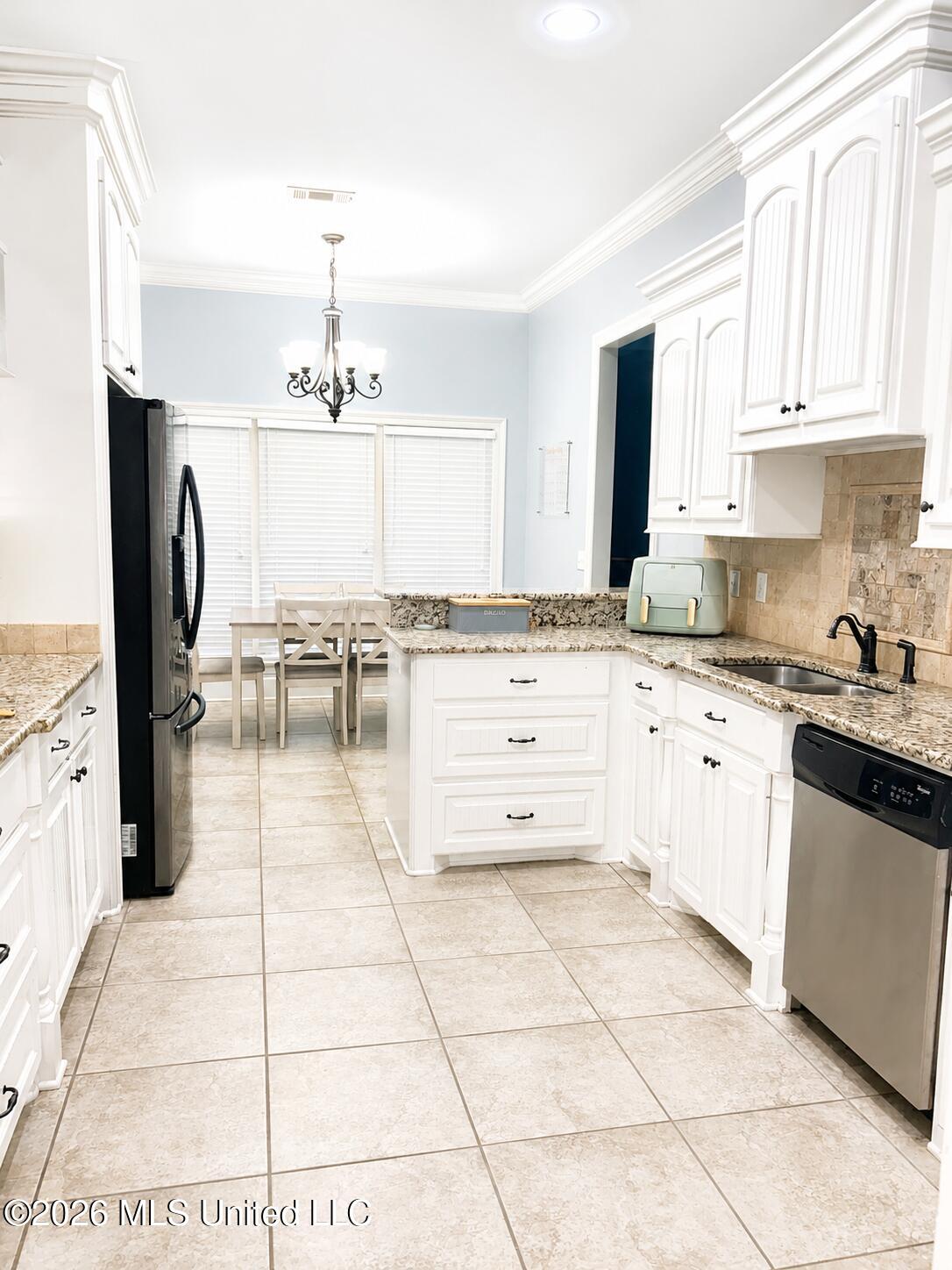 114 Germany Drive Canton, MS 39046 - Photo 4 of 13 C45D9E07-1103-4E6C-A7E0-24D4E6E36BF1