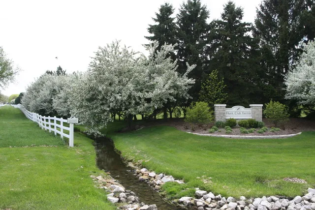 a view of a garden with houses