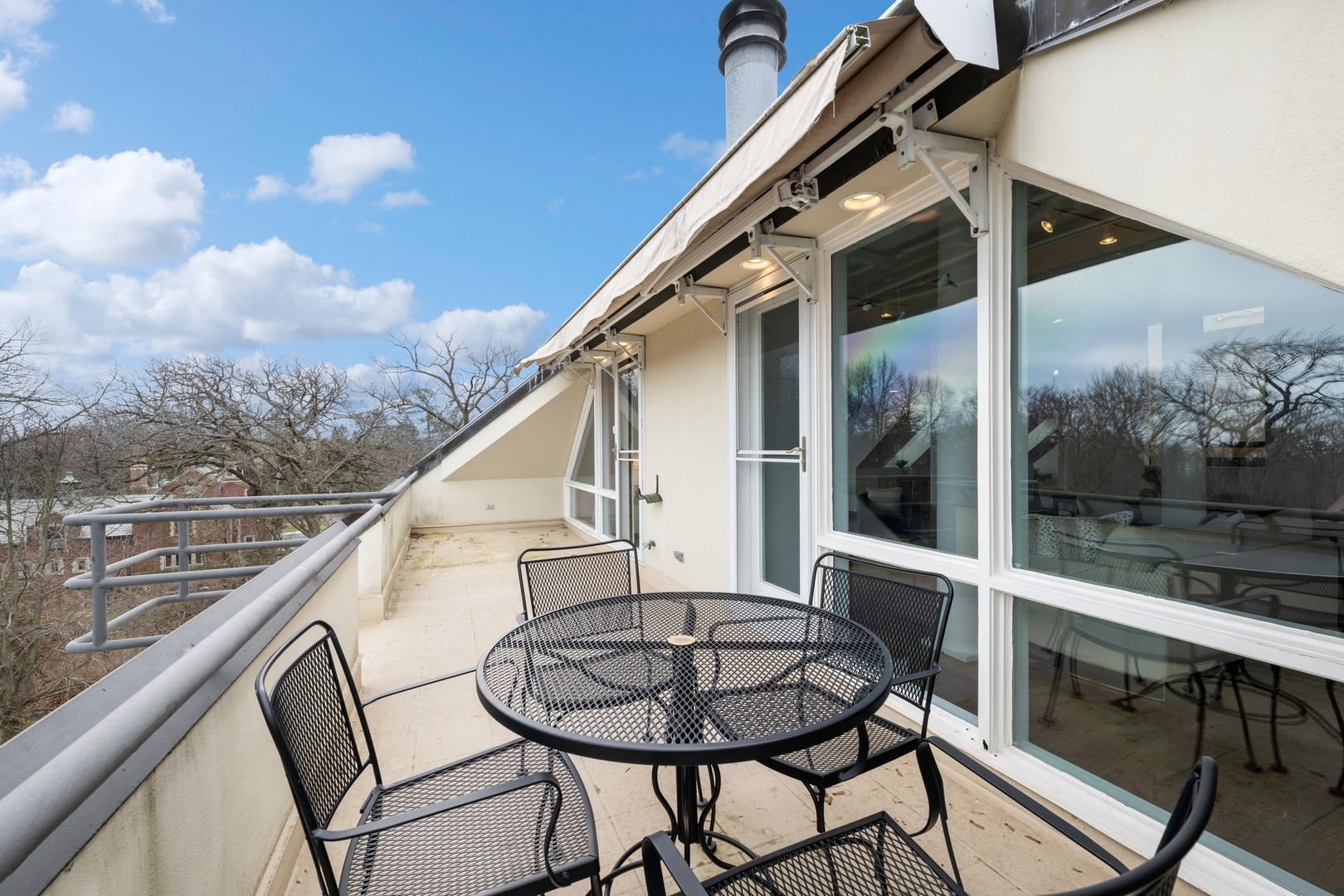 535 North Mayflower Road, Unit D Lake Forest, IL 60045 - Photo 23 of 25 a view of balcony with furniture and city view