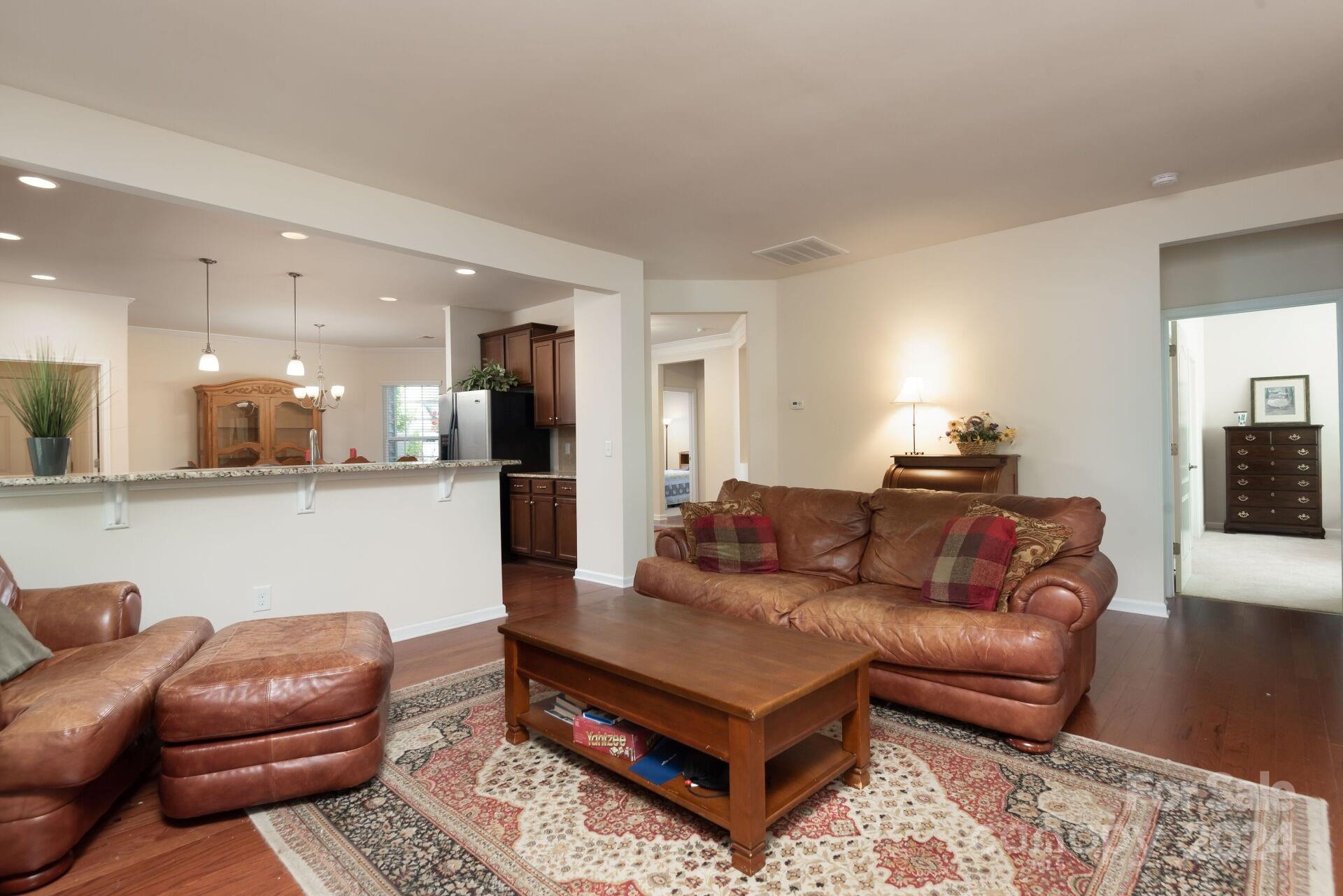 4325 Perth Road Indian Land, SC 29707 - Photo 11 of 33 a living room with furniture and a view of kitchen