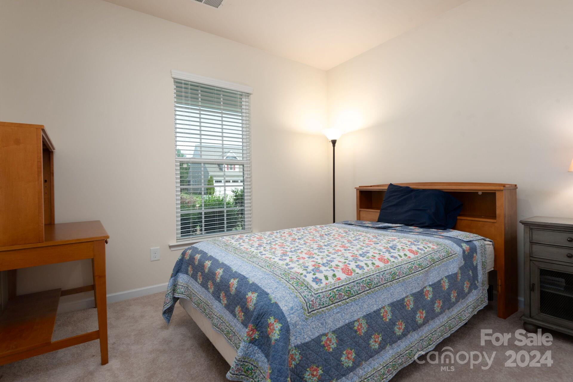 4325 Perth Road Indian Land, SC 29707 - Photo 18 of 33 a bedroom with a bed and a window