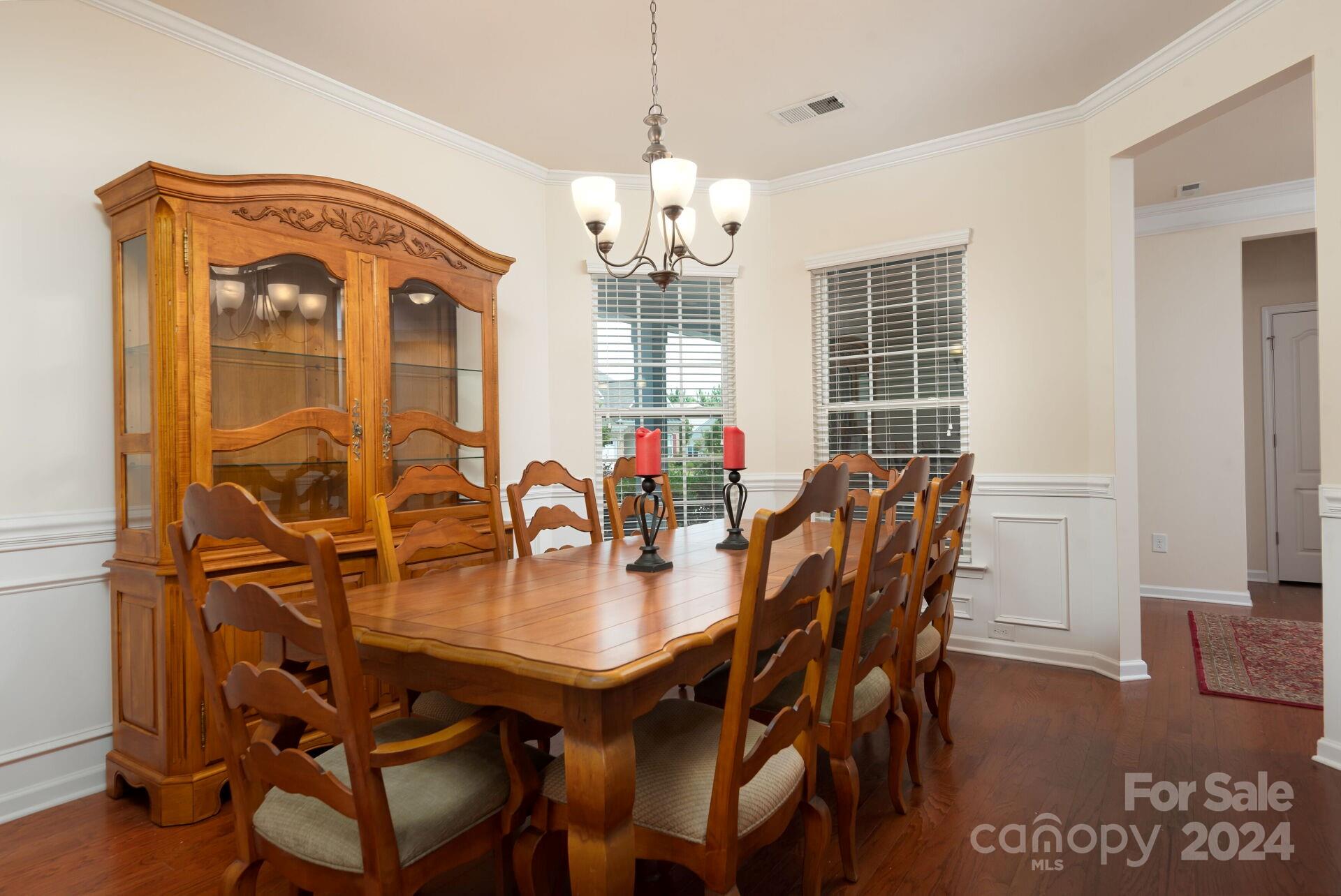 4325 Perth Road Indian Land, SC 29707 - Photo 4 of 33 a view of a dining room with furniture and chandelier