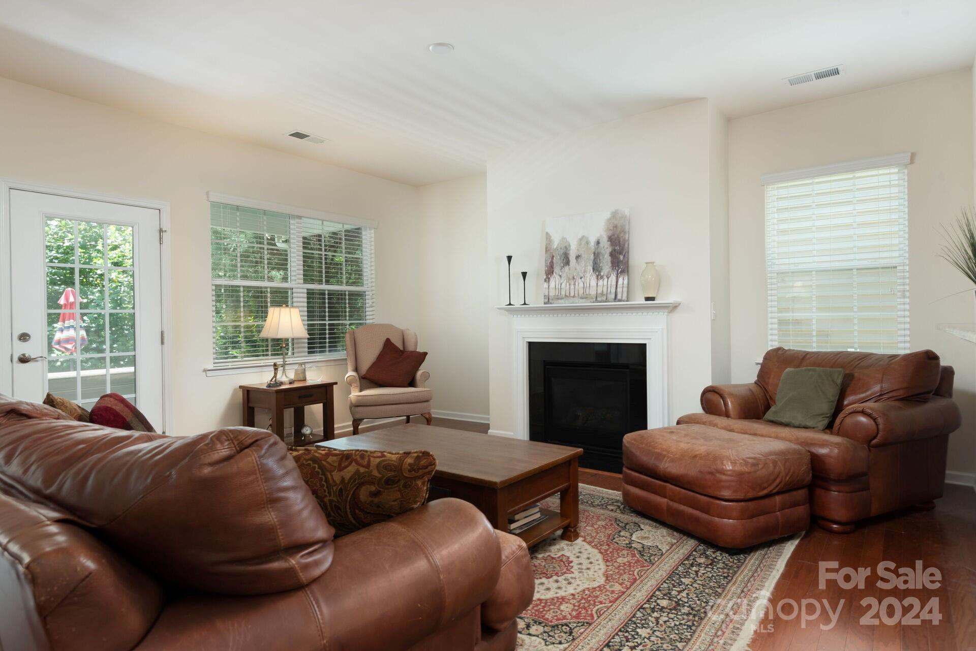4325 Perth Road Indian Land, SC 29707 - Photo 9 of 33 a living room with furniture and a fireplace