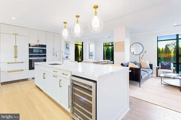 a bedroom with a large bed and a large window