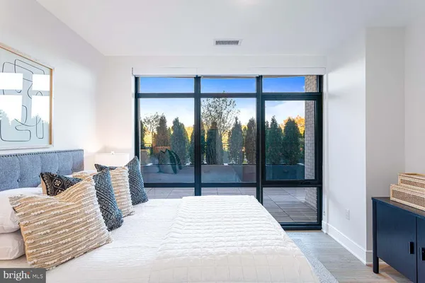 a living room with furniture fireplace and a flat screen tv