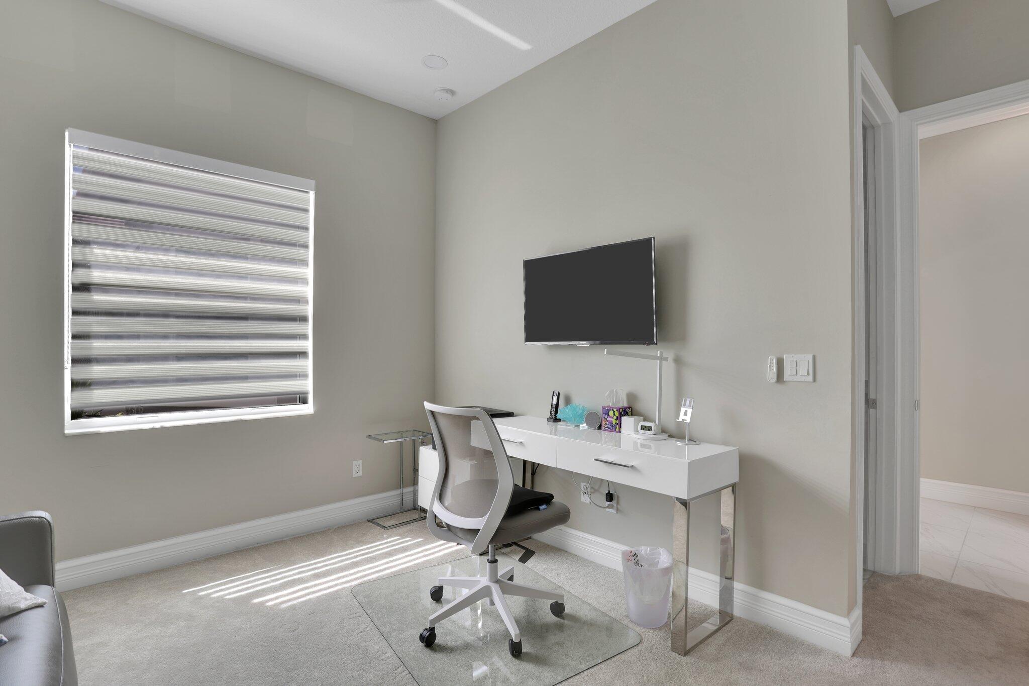 8203 Arabian Range Road Boynton Beach, FL 33473 - Photo 20 of 50 a view of a workspace with a window