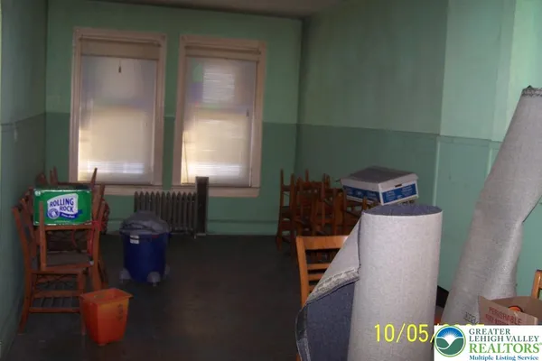 a room with furniture and a fireplace