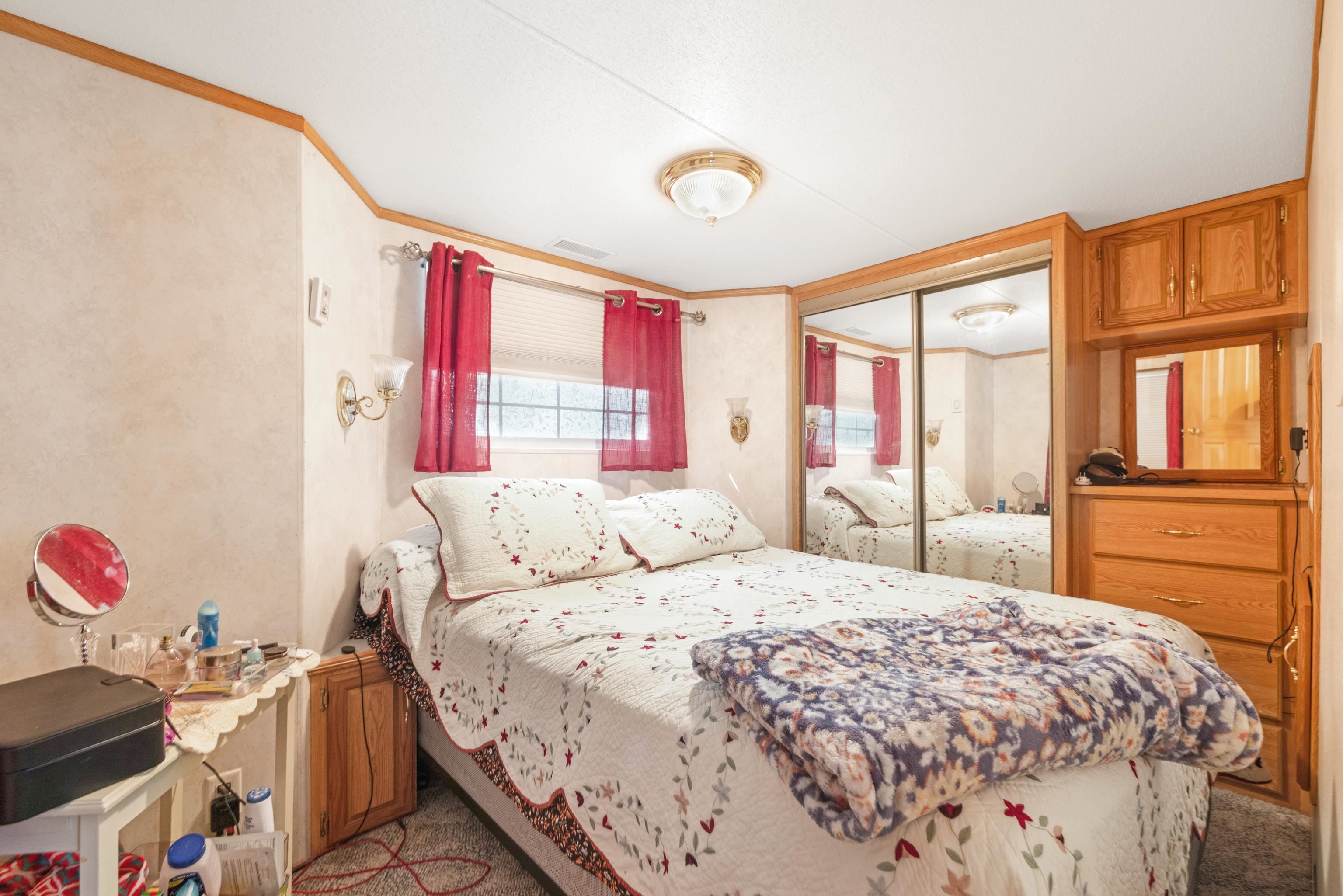 709 Rt 9 S, Unit 384 Cape May, NJ 08204 - Photo 15 of 22 a bedroom with a bed and a window