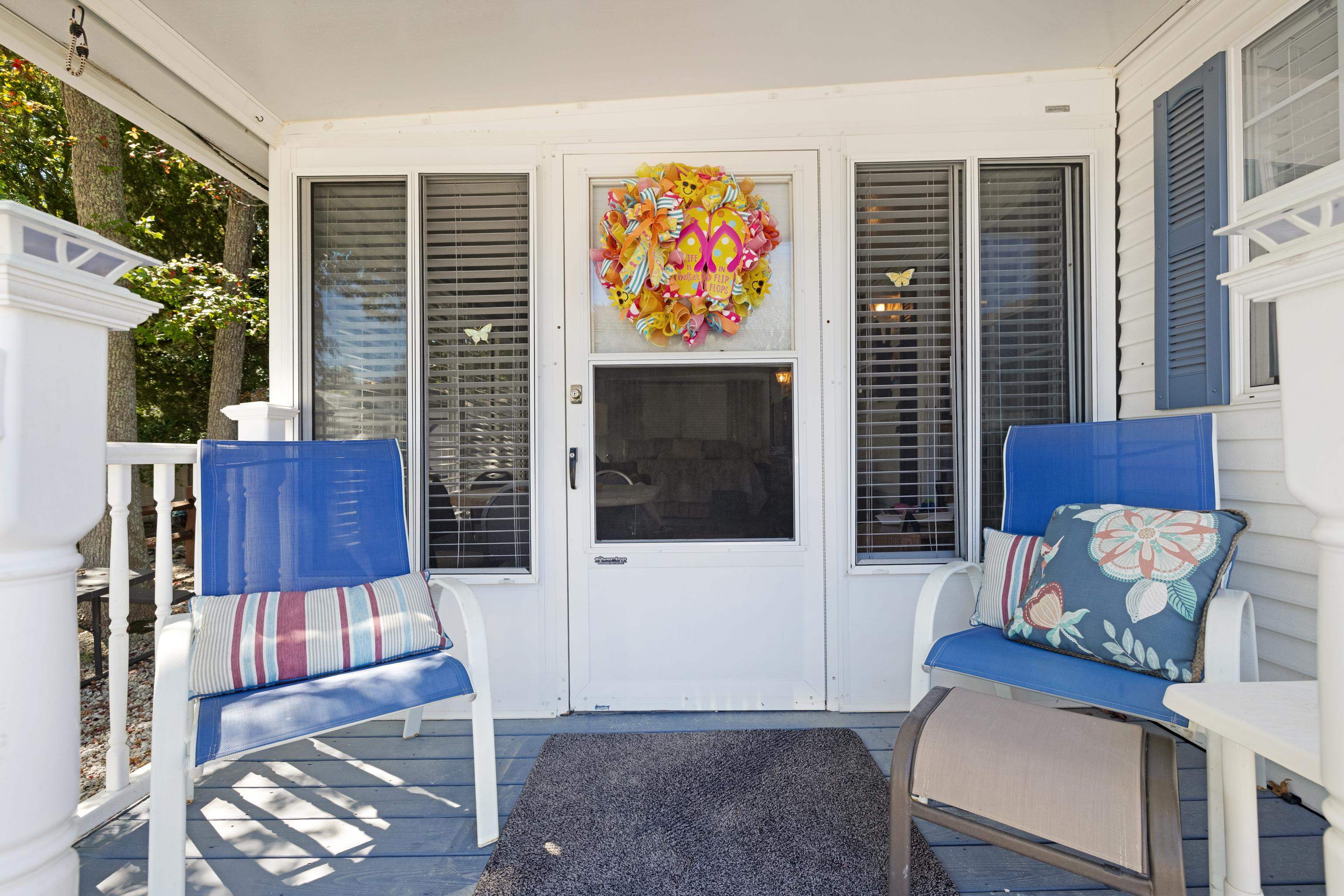 709 Rt 9 S, Unit 384 Cape May, NJ 08204 - Photo 2 of 22 a living room with furniture and a flat screen tv
