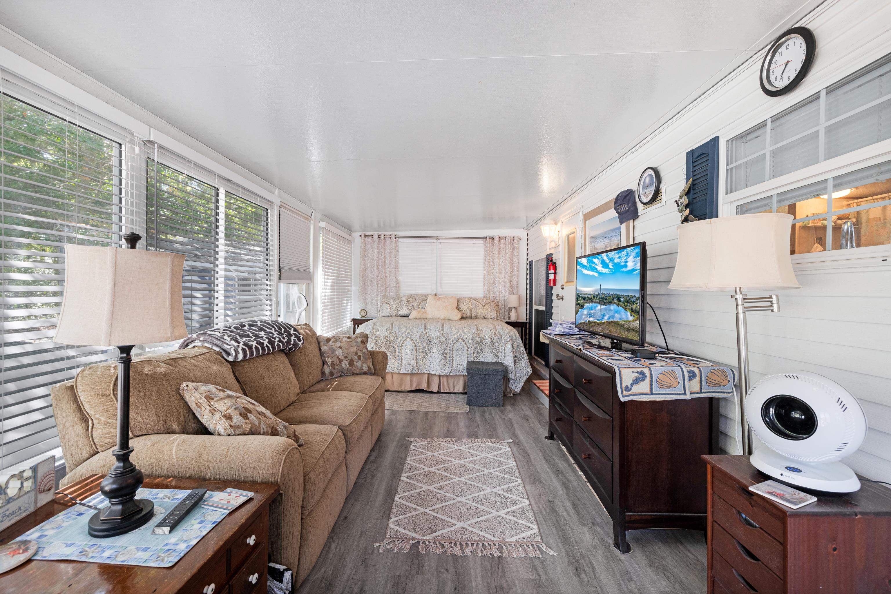 709 Rt 9 S, Unit 384 Cape May, NJ 08204 - Photo 5 of 22 a living room with furniture and a window