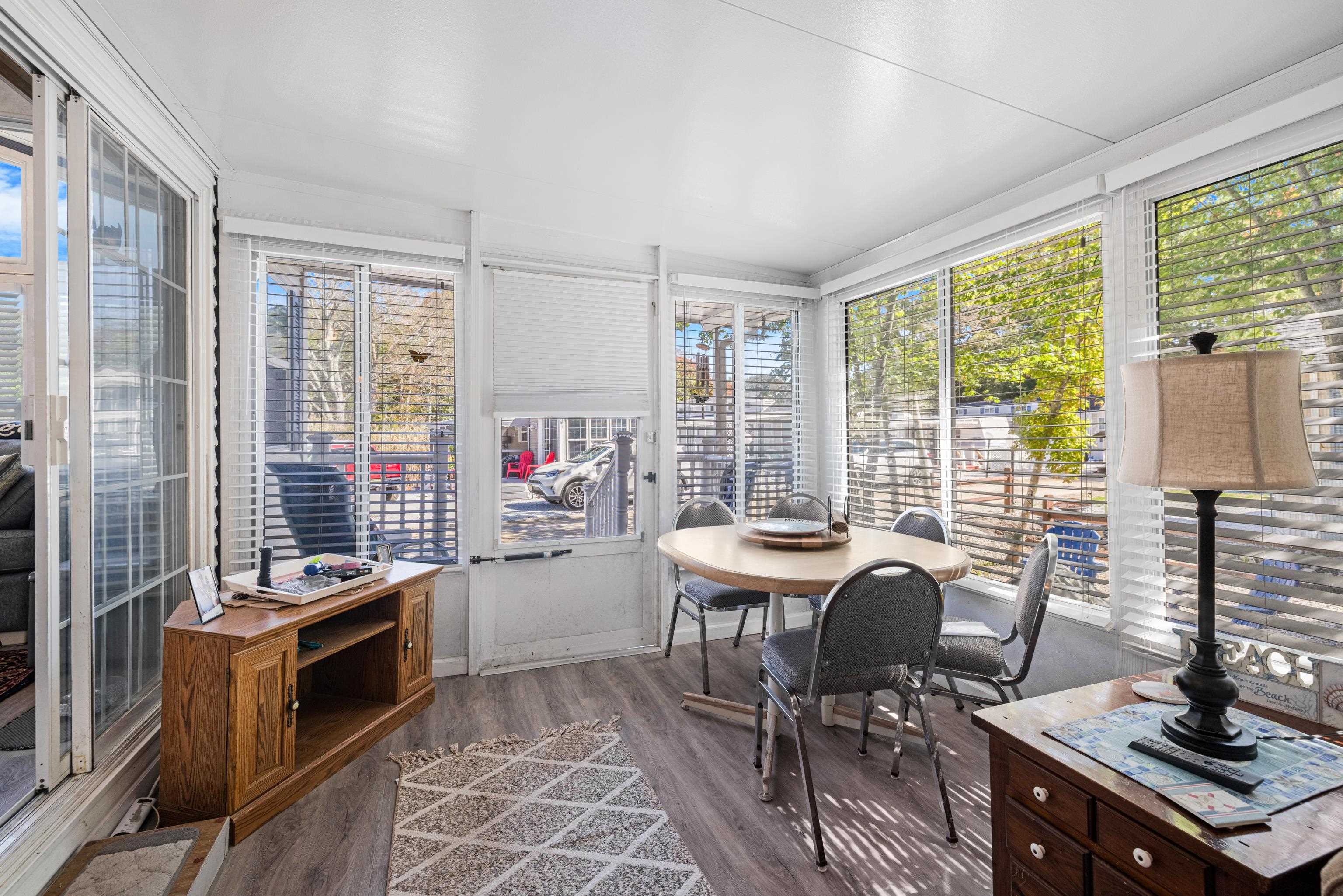 709 Rt 9 S, Unit 384 Cape May, NJ 08204 - Photo 7 of 22 a view of a dining room with furniture window and outside view