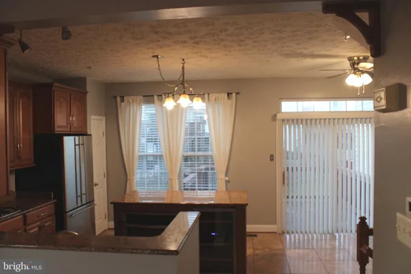 a view of a room with a chandelier
