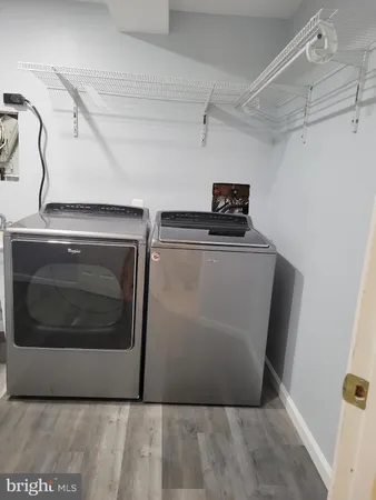 a view of a utility room with washer and dryer