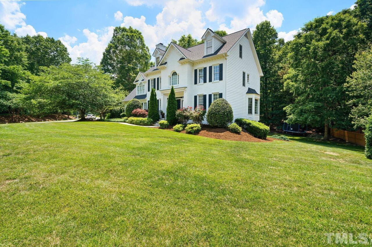 5533 Overleaf Court Raleigh, NC 27615 - Photo 2 of 32 a view of a house with a yard