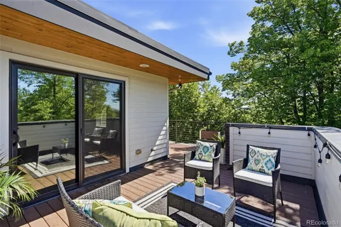 a outdoor living space with furniture and garden view